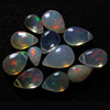 truly very rare - Ethiopian Opal - really - tope grade high quality smooth polished - pear briolett - huge size - 4x6 - 6x9.5 mm approx 12 pcs - each pcs - have amazing - beautifull - flashy fire all around in the stone approx STUNNING QUALITY - VERY VERY RARE